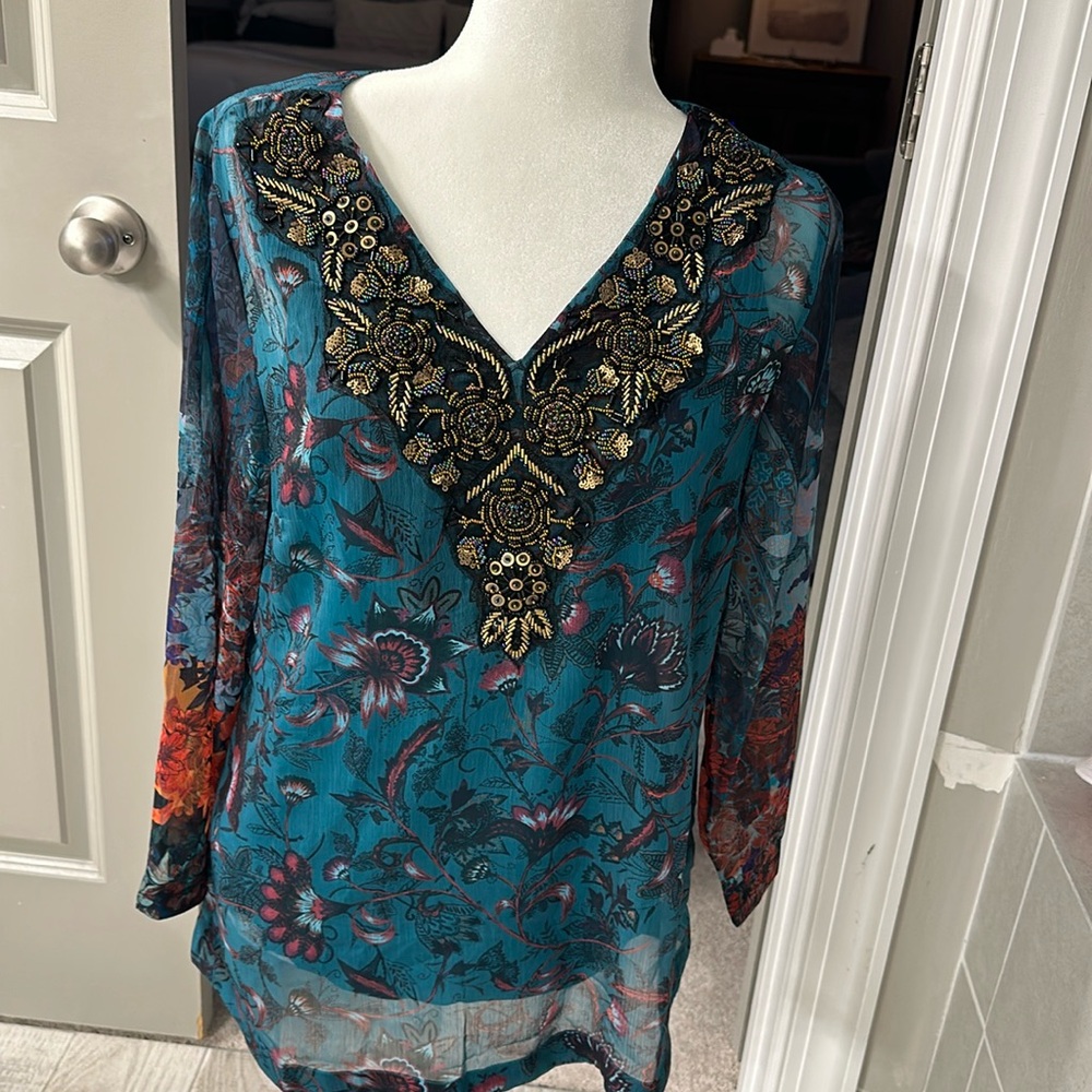 Gently worn soft surroundings embellished top.